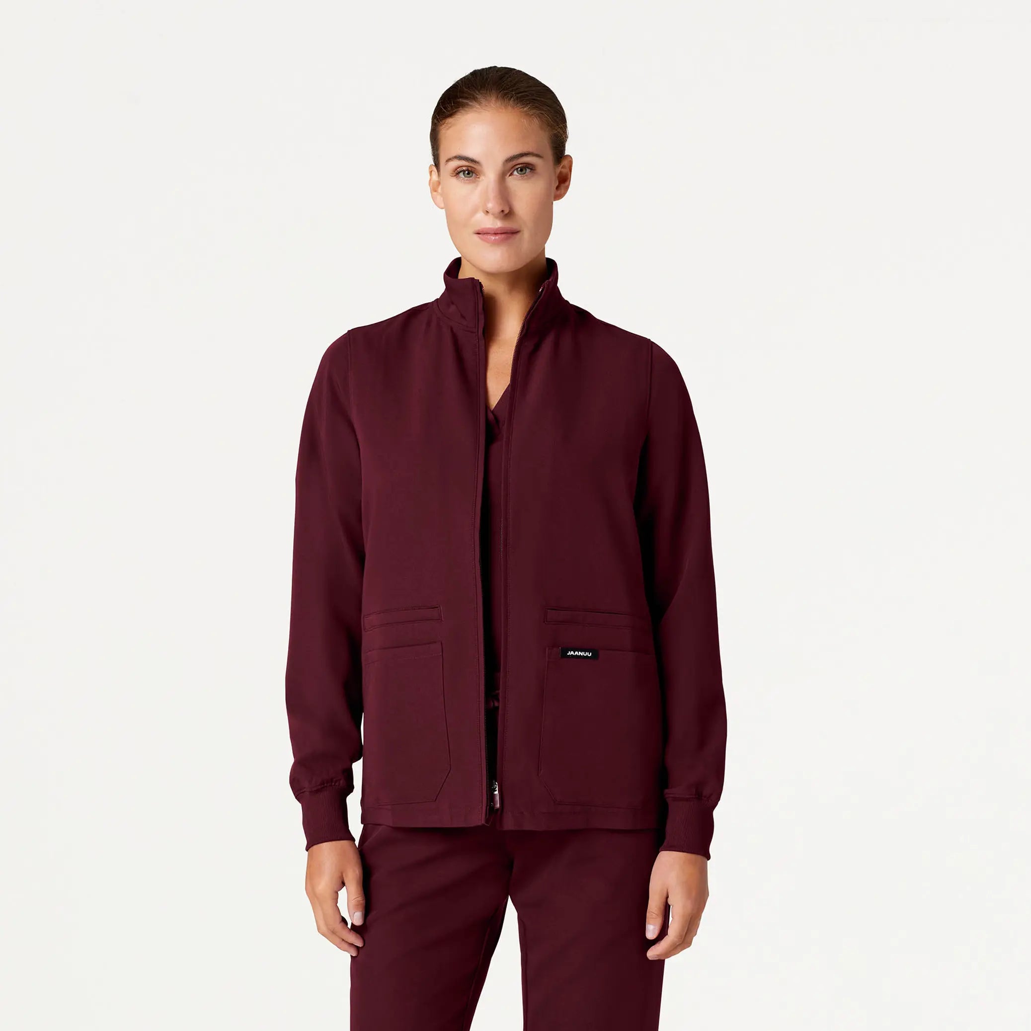 Jaanuu Women's Ceri Essential 6-Pocket Scrub Jacket - Burgundy Tailored Jacket Straight Jacket A-Line Jacket